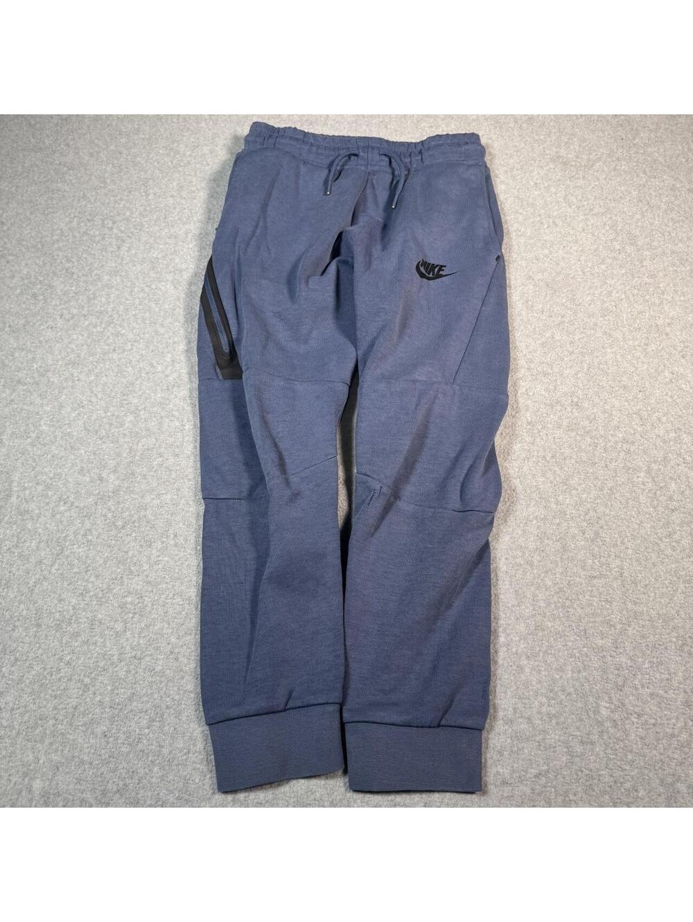 Navy blue Nike tech sweatpants